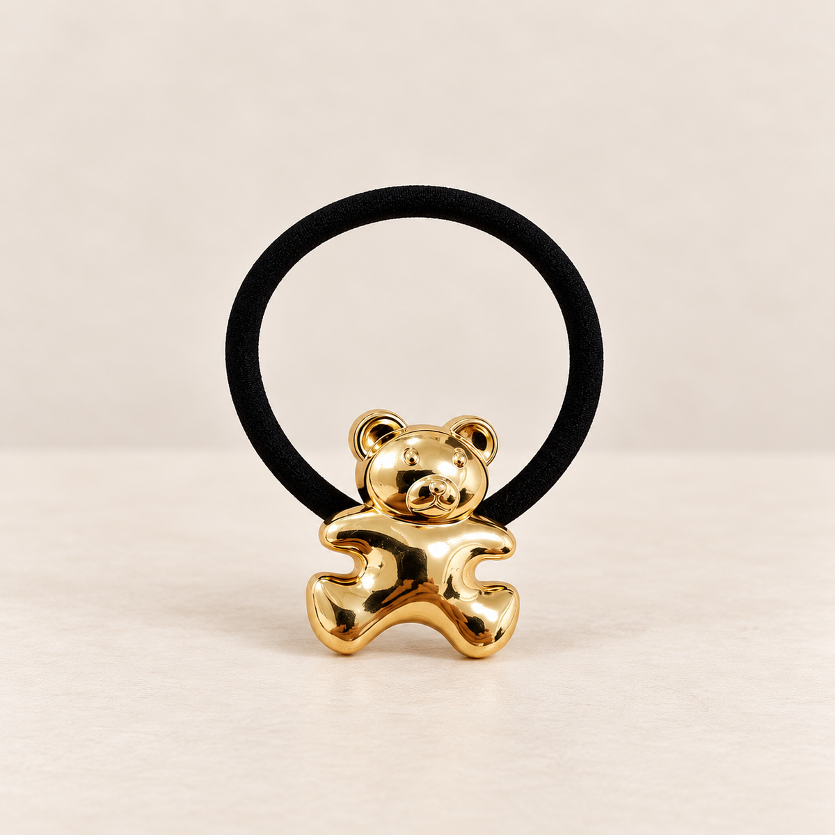 MINI OSITO DORADO · COLETERO DE HIERRO