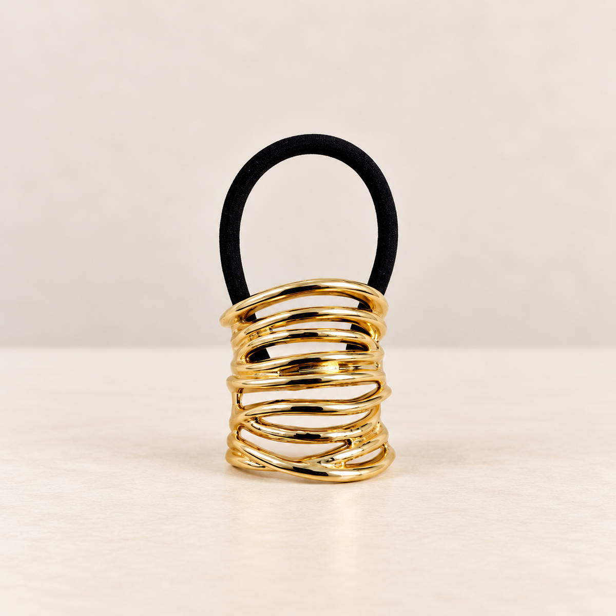 GOLDEN TWIST · COLETERO DE METAL