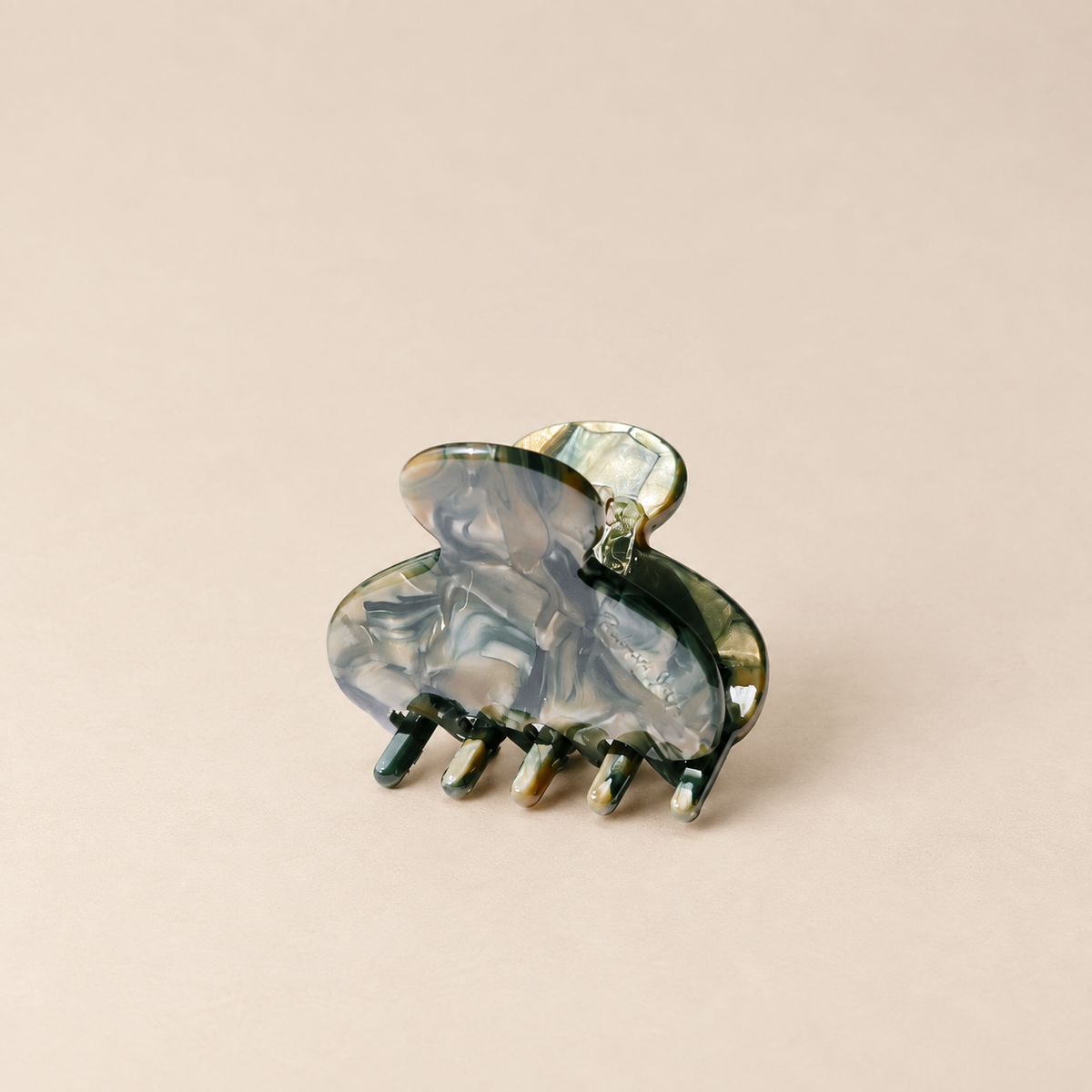OLIVA MÁRMOL · PINZA DE PELO