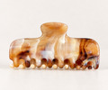 AMBER MUSE · PINZA DE CABELLO